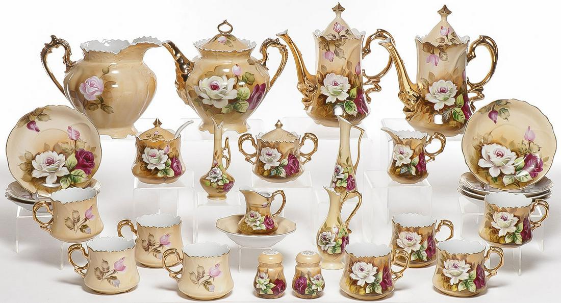 29-PC LEFTON CHINA TEA SET: 29-PC LEFTON CHINA TEA SET. Each beautifully decorated with roses and gilt trim on a tan ground. Greatest height 8.75 inches. SHIPPING NOTICE: Jackson's is your sole and only source for one stop packi