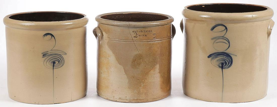 RARE CEDAR FALLS, IA CROCK & MORE: RARE CEDAR FALLS, IA CROCK & MORE. Comprising a rare 2 gallon crock (pictured at center) impressed on rim Cedar Falls, Iowa with the number 2 with applied handles on side, height 9.5 inches (cracked).