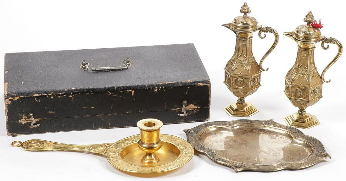 SILVER GILT CRUET SET & GILDED BUGIA: SILVER GILT CRUET SET & GILDED BUGIA. Comprising a finely crafted German silver-gilt cruet set in the Gothic taste with matching tray marked Hubert Gotzes. 800, overall height 9.5 inches. Together wit