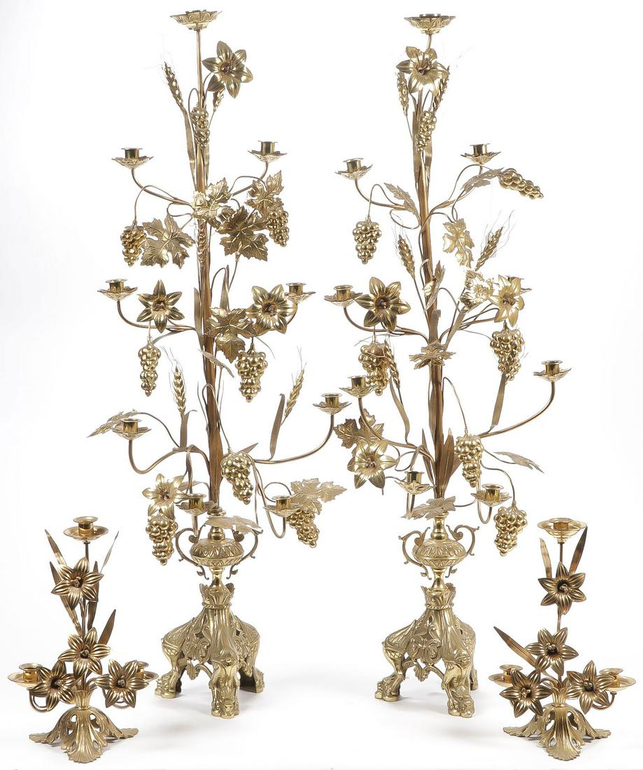 ORNATE & IMPRESSIVE GILDED ALTAR CANDELABRA: ORNATE & IMPRESSIVE GILDED ALTAR CANDELABRA. Comprising a pair of large and impressive gilt-bronze nine-light candelabra on trefoil winged griffin bases, and embellished with Eucharistic motifs of gra