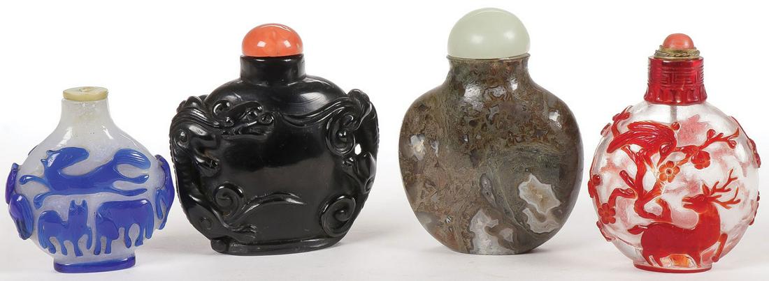 OUR CHINESE SNUFF BOTTLES, QING: OUR CHINESE SNUFF BOTTLES, QING. Comprising four individual snuff bottles of various materials including a Peking glass bottle decorated with horses, a black carved lacquer bottle decorated with oppos