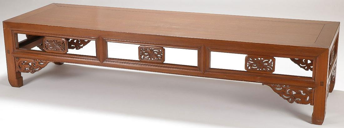 CHINESE CARVED ALTAR STYLE LOW TABLE: CHINESE CARVED ALTAR STYLE LOW TABLE. With carved open skirt. Height 15.5 inches, width 70 inches, depth 21.25 inches. SHIPPING NOTICE: Jackson's is your sole and only source for one stop packing and