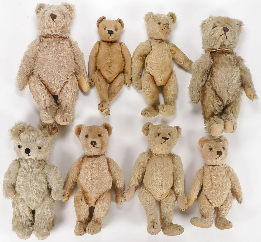 8 ANTIQUE TO VINTAGE MOHAIR BEARS: 8 ANTIQUE TO VINTAGE MOHAIR BEARS. Some are possibly attributed to Steiff, each bear with five-piece jointed body, with glass and button eyes, each exhibit wear consistent with age. Greatest height 13