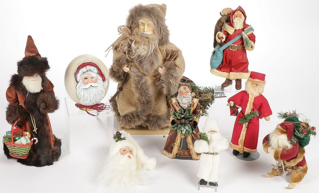 VINTAGE REPRODUCTION CHRISTMAS DÉCOR: VINTAGE REPRODUCTION CHRISTMAS DÉCOR. Comprising six varying modern ornate Santa figures all of different sizes. Greatest height 16 inches. SHIPPING NOTICE: Jackson's is your sole and only source