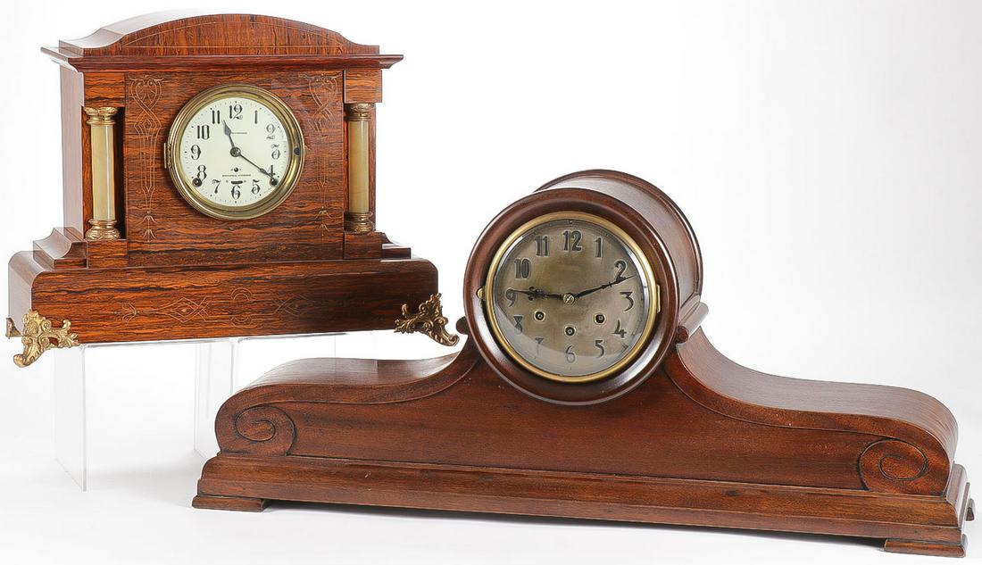 A PAIR OF MANTEL CLOCKS: A PAIR OF MANTEL CLOCKS. Comprising a large and impressive mahogany veneer mantel clock with Gustav Becker works. Height 13.25 inches, width 30 inches. Together with a Seth Thomas mantel clock with So