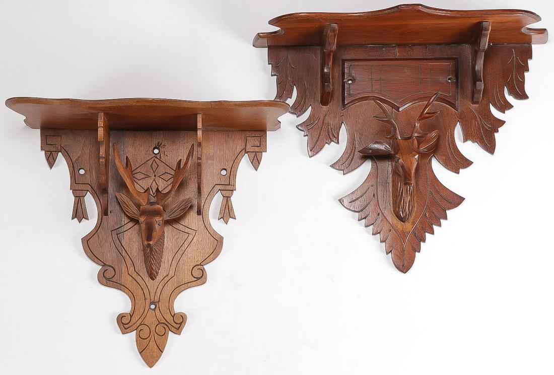 VICTORIAN WALNUT STAG WALL SHELVES: VICTORIAN WALNUT STAG WALL SHELVES. Each with carved stag head beneath over hanging shelf. Greatest measurement 15.5 inches. SHIPPING NOTICE: Jackson's is your sole and only source for one stop packin