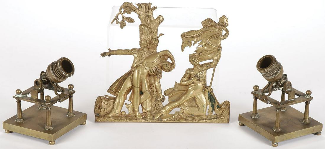 FRENCH BRONZE DECORATIVE GROUP: FRENCH BRONZE DECORATIVE GROUP. Comprising two finely crafted miniature desk ornaments in the form of 18th century articulated mortars together with a finely cast gilt bronze plaque depicting an histo
