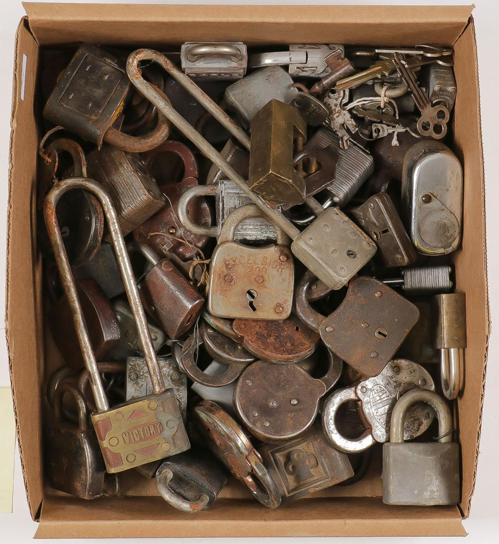 OVER 50 VINTAGE PADLOCKS: OVER 50 VINTAGE PADLOCKS. Comprising various makers, types, shapes, models and time periods. Some with the original keys. Greatest length 7.5 inches. SHIPPING NOTICE: Jackson's is your sole and only s
