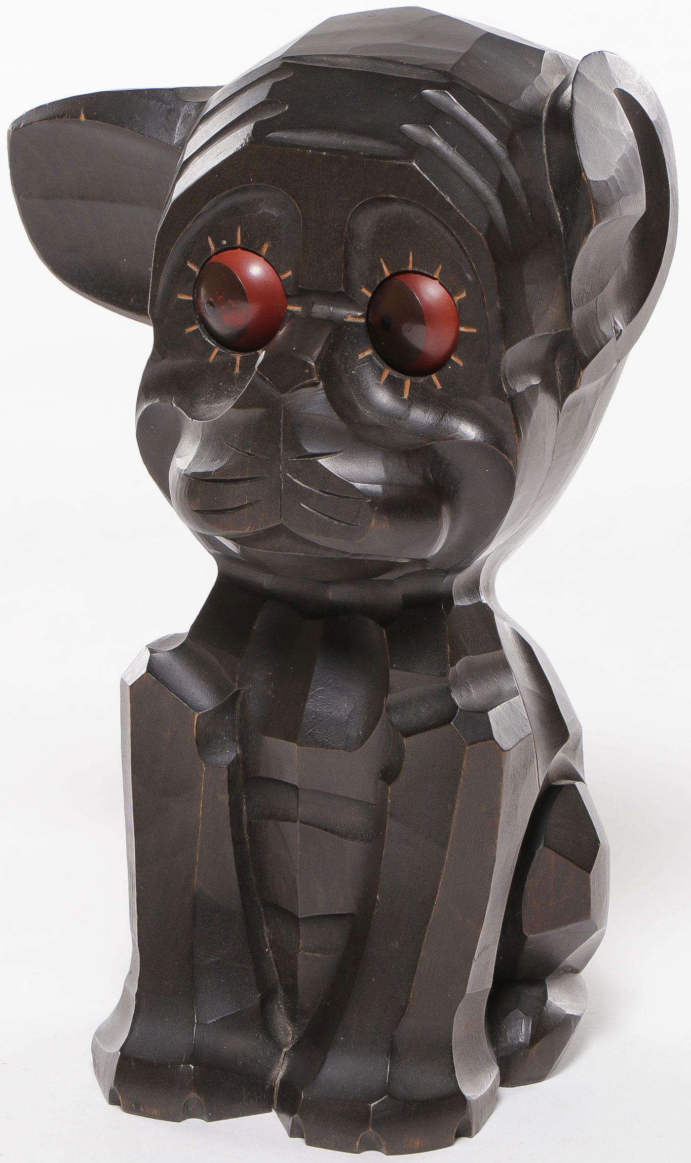 GERMAN WOOD NOVELTY GOOGLY EYE DOG CLOCK: GERMAN WOOD NOVELTY GOOGLY EYE DOG CLOCK. Comprising a carved wood dog with googly eyes, verso marked Made in Germany and patent date 1920. Takes a wind and runs. Height 7 inches. SHIPPING NOTICE: Jac
