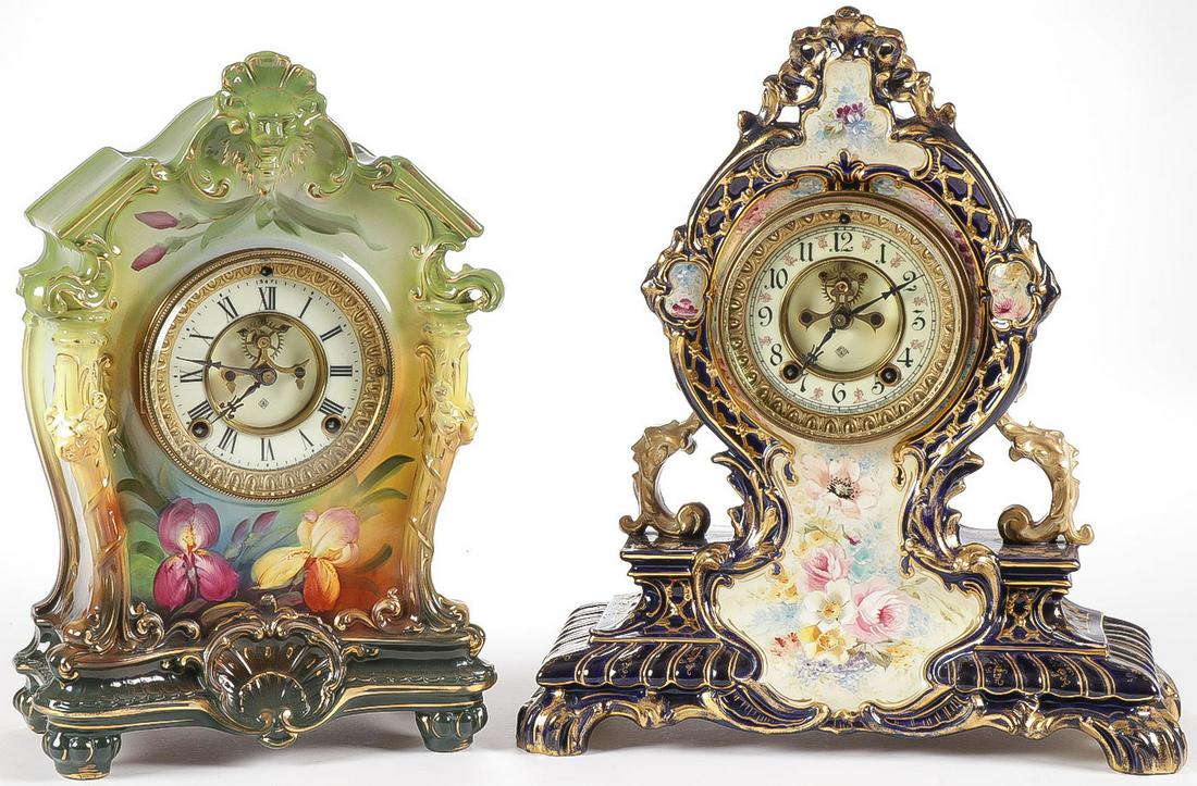 PAIR ROYAL BONN MANTEL CLOCKS: PAIR ROYAL BONN MANTEL CLOCKS. Comprising two Royal Bonn glazed and hand decorated cases, one decorated with irises, the other in cobalt blue and gold with hand-painted flowers and each with an Ansoni