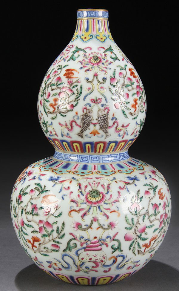 CHINESE FAMILLE ROSE PORCELAIN DOUBLE GOURD VASE: A VERY FINE CHINESE FAMILLE ROSE PORCELAIN DOUBLE GOURD VASE, 19TH CENTURY. The double gourd shape finely painted with an allover famille rose decoration of auspicious motifs including birds, bats, pe