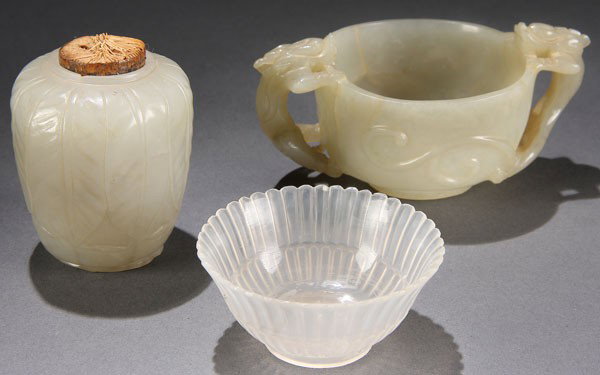 3 PIECE CHINESE CARVED WHITE JADE, QING DYNASTY: THREE PIECE CHINESE CARVED WHITE JADE, QING DYNASTY. Comprising a well hollowed nephrite jar with carved leaves and bundled straw stopper, height 2 inches (5.1 cm). A two handled cup with carved drago