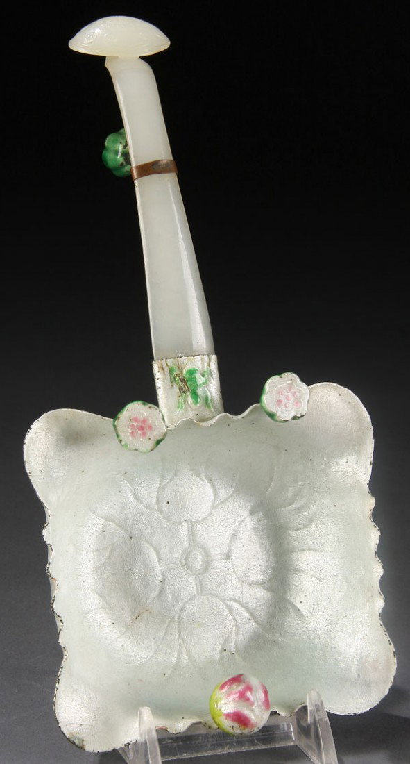 A VERY FINE CHINESE CARVED WHITE JADE HAIR PIN: A VERY FINE CHINESE CARVED WHITE JADE HAIR PIN, QING DYNASTY. In an evenly toned semi translucent white jade with a thinly carved flattened shaft terminating with an incised rosette and C scroll bloss