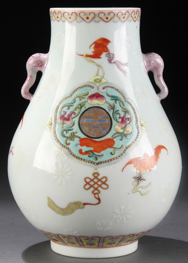 A CHINESE FAMILLE ROSE VASE, 20TH CENTURY: A CHINESE FAMILLE ROSE VASE, 20TH CENTURY. With Buddhist symbols and "Bianlo-Sopra-Bianco" ground. Qianlong mark. Height 8.25 inches (21 cm).