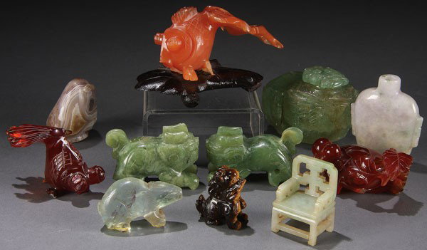 11-PC CHINESE CARVED JADE, CRYSTAL FIGURE GROUP: AN 11 PIECE CHINESE CARVED JADE, CRYSTAL AND CARNELIAN FIGURE GROUP, 19TH/20TH CENTURY. Comprising a rock crystal rabbit and ink well, a miniature jade chair, two carnelian gold fish and other hardsto