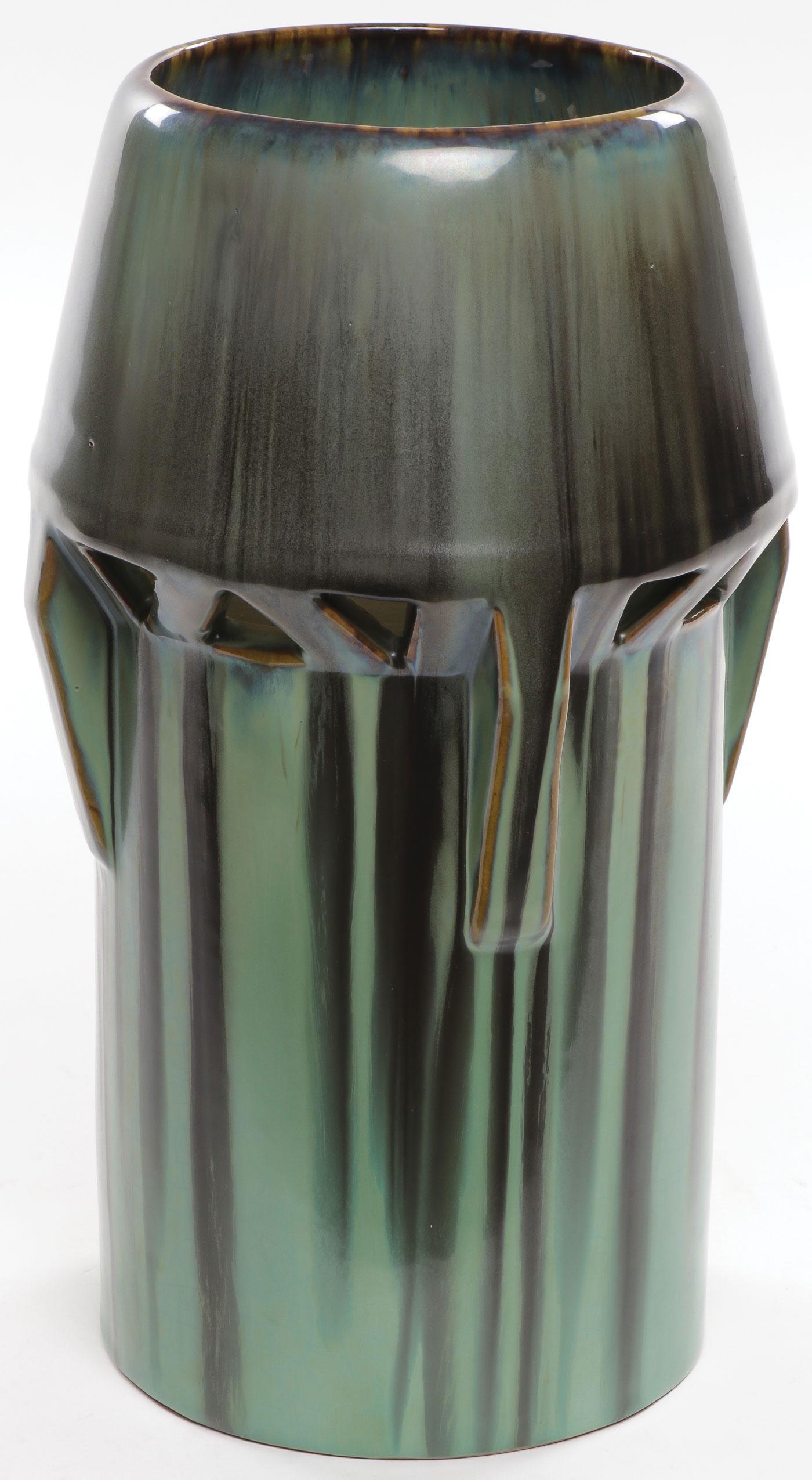 RARE FULPER POTTERY CUT OUT BUTTRESS VASE: RARE FULPER POTTERY CUT OUT BUTTRESS VASE. Comprising a rare buttressed Vasekraft vase in green and caramel flambÉ glaze. Underside with ink stamped Fulper mark. Height 13 inches. SHIPPING NOTICE