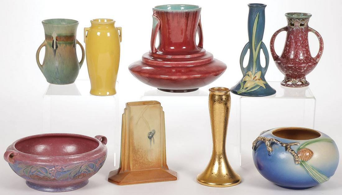 NINE ROSEVILLE VASES: NINE ROSEVILLE VASES. Comprising nine individual pieces including a large Orian double handled vase in magenta, a Futura vase of rectangular tapering form, a Monticello vase with double handles, a Ban