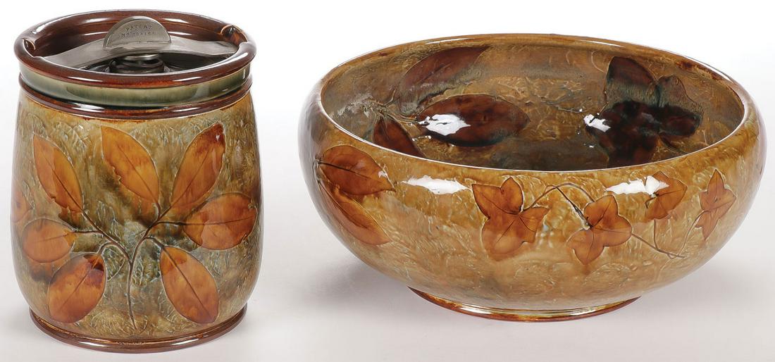 A DOULTON LAMBETH LEAF BOWL AND LIDDED JAR: A DOULTON LAMBETH LEAF BOWL AND LIDDED JAR. Greatest measurement 10 inches diameter. SHIPPING NOTICE: Jackson's is your sole and only source for one stop packing and shipping. With over 50 years