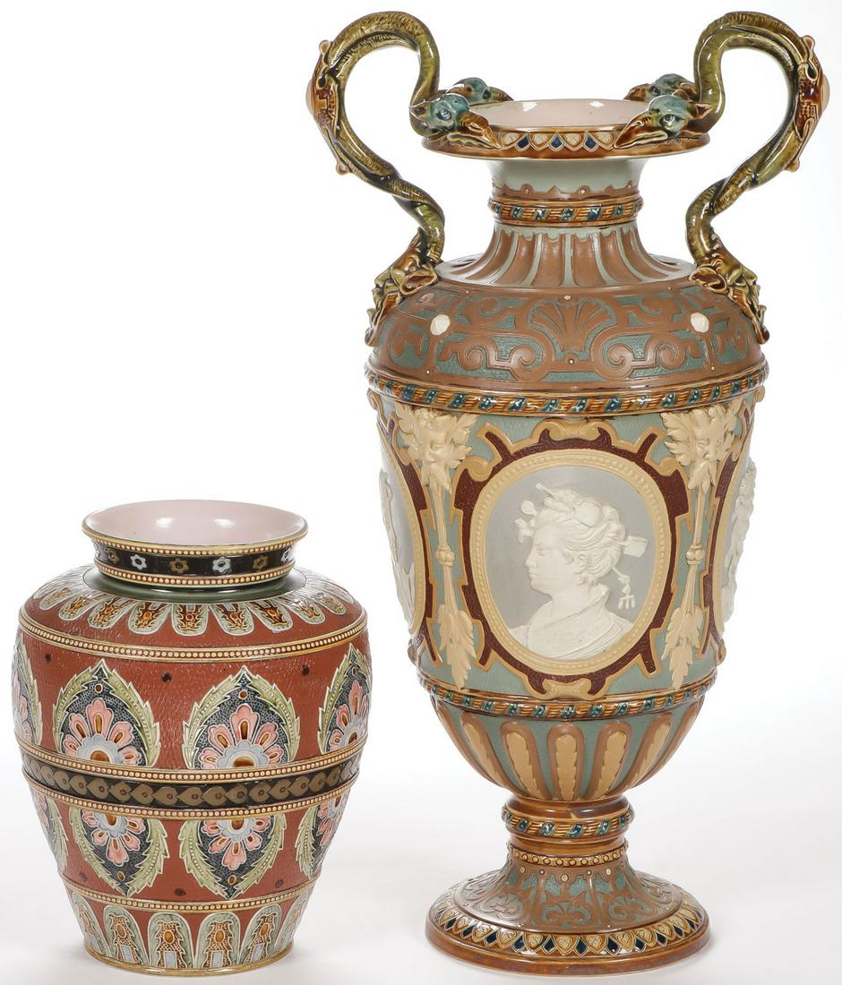PAIR OF EXCEPTIONAL METTLACH VASES: PAIR OF EXCEPTIONAL METTLACH VASES. Comprising a four continents portrait vase of traditional form, the spread foot base supporting a Grecian urn banded with four medallions depicting in portraits in 