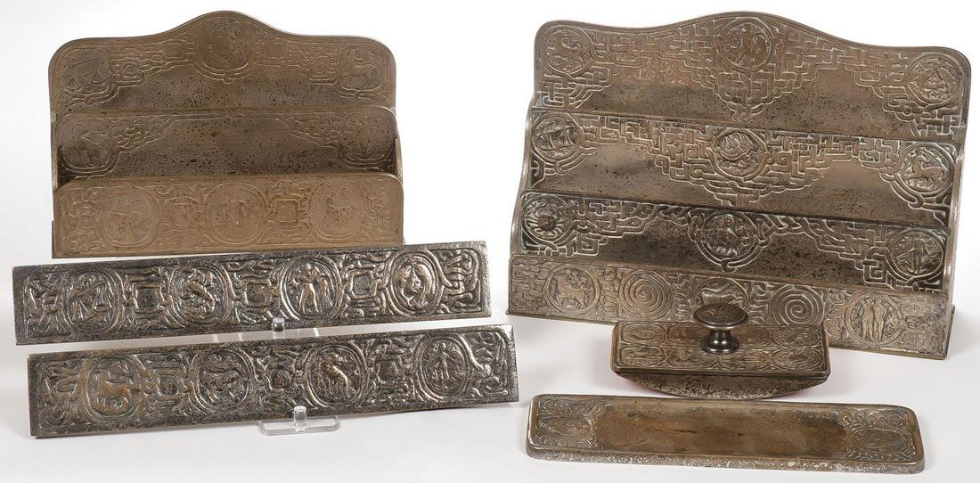 TIFFANY ZODIAC DESK SET: TIFFANY ZODIAC DESK SET. Comprising a Tiffany Studios etched silver finished desk set, comprising a large letter holder and small letter holder, a pen tray, a blotter, and two blotter ends. Greatest m