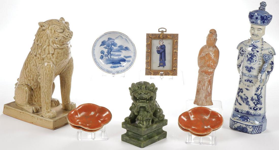 MIXED ASIAN ARTS LOT: MIXED ASIAN ARTS LOT. Comprising 10 individual pieces, including an interesting Chinese glazed foo lion, a blue and white glazed emperor holding ruyi scepter, the underside of base with impressed mark