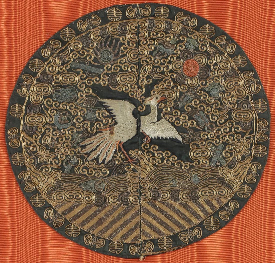 CHINESE EMBROIDERED RANK BADGE 19TH C: CHINESE EMBROIDERED RANK BADGE 19TH C. Of circular design depicting a bird in flight. Diameter of medallion 11.5 inches (29 cm). SHIPPING NOTICE: Jackson's is your sole and only source for one sto