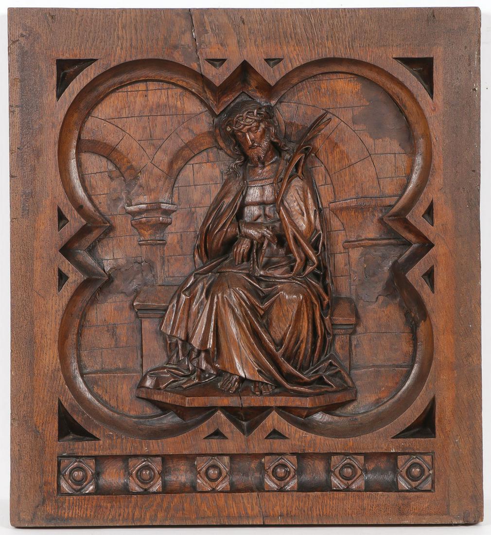 LARGE NEO GOTHIC CARVED OAK PANEL OF CHRIST, 19TH: LARGE NEO GOTHIC CARVED OAK PANEL OF CHRIST, 19TH C. Comprising a thick square oak panel deeply carved with sunken quatrefoil reserve above a row of flower heads and carved in high relief an image of 