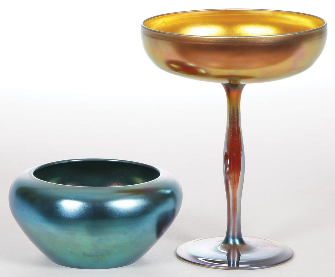 STEUBEN AURENE COMPOTE AND BOWL: STEUBEN AURENE COMPOTE AND BOWL. Comprising a gold iridized footed compote engraved on base "Steuben Aurene" and numbered 2642 (height 8 inches). Together with a blue iridized bowl with polish
