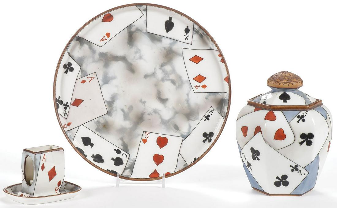 NIPPON CARD SMOKING SET: NIPPON CARD SMOKING SET. Comprising three individual pieces, all with hand-decorated playing card motif, including a tray, humidor (hairline) and match holder ashtray. Each marked Nippon. Greatest