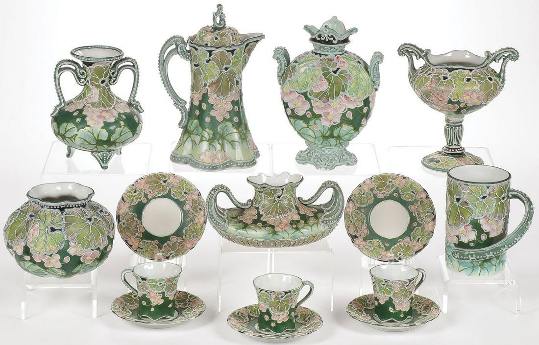 15 PCS OF MORIAGE DECORATED NIPPON PORCELAIN: 15 PCS OF MORIAGE DECORATED NIPPON PORCELAIN. Including a partial tea service with lidded teapot, five saucers and three matching cups. A handled mug, a double handled loving cup, various vases includ