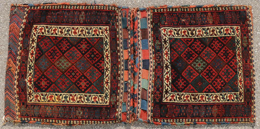 TWO GOOD SEMI-ANTIQUE BAG FACE WEAVINGS: TWO GOOD SEMI-ANTIQUE BAG FACE WEAVINGS. Comprising two pairs of bag faces, both of traditional design, including a Jaff Kurd pair of bag faces circa 1960, 51.25 inches x 25.5 inches, and a Qashqa