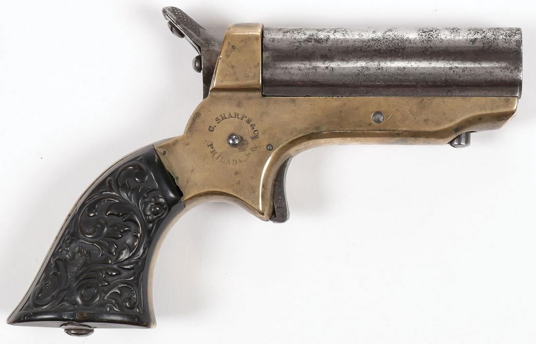 A SHARPS PEPPERBOX PISTOL 1859: A SHARPS PEPPERBOX PISTOL 1859. In .22 caliber, 2.5-inch barrels, serial number 38001. SHIPPING NOTICE: Jackson's is your sole and only source for one stop packing and shipping. With over 50 years of