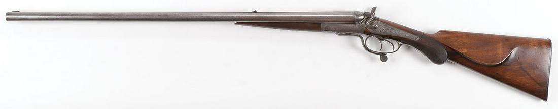 A FINE J.P. SAUER & SOHN CAPE GUN: A FINE J.P. SAUER & SOHN CAPE GUN. With ornate Damascus barrels, the shotgun barrel approximately 16 gauge and the rifle barrel approximately 44 caliber. With checkered walnut stock and heavily engrav