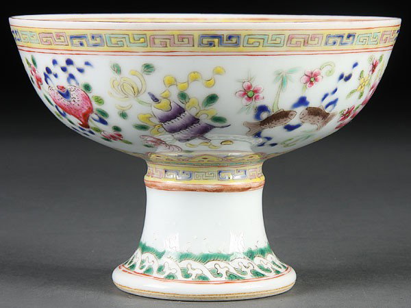 CHINESE QING FAMILLE ROSE PORCELAIN STEM BOWL: A CHINESE QING DYNASTY FAMILLE ROSE PORCELAIN STEM BOWL, Guangxu mark and of the period, the exterior decorated with Buddhist symbols and polychromed enamels, raised on a tall flaring foot pedestal. S