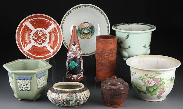 9 ORIENTAL CERAMIC WARES GROUP, 19TH/20TH CENTURY: NINE PIECE ORIENTAL CERAMICWARES GROUP, 19TH/20TH CENTURY. Including famille rose, famille verte, celadon glazed, redware, and a red Fitzhugh style Kutani bowl. Some damage. The largest diameter 11 in