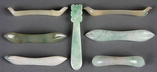 7 CHINESE CARVED NEPHRITE & JADEITE HAIR PINS: SEVEN CHINESE CARVED NEPHRITE AND JADEITE HAIR PINS, 19TH/20TH CENTURY. Including a jadeite flattened pin with carved bat terminal, two mutton fat, green nephrite and others. Length 2.75 inches (6.5 c