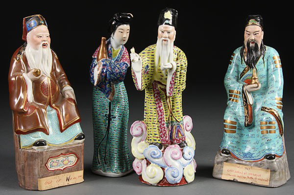 FOUR CHINESE FAMILLE ROSE PORCELAIN FIGURES, EARL: FOUR CHINESE FAMILLE ROSE PORCELAIN FIGURES, EARLY 20TH CENTURY, in the form of various immortals including the god of medicine and wealth. Height 10 inches (26 cm).
