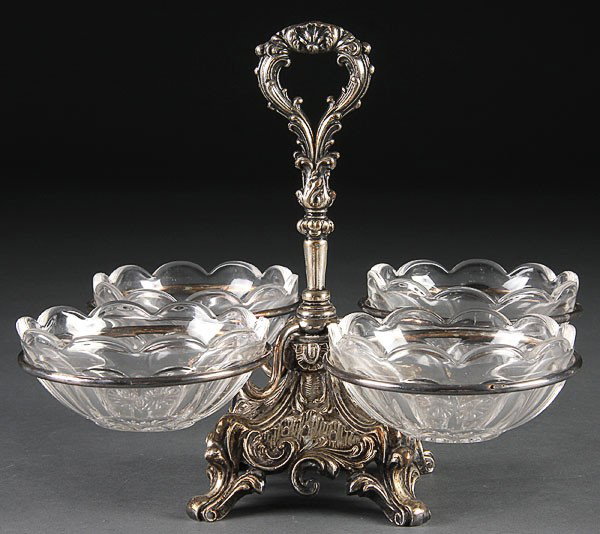 VICTORIAN STYLE SILVERED BRONZE & HEISEY EPERGNE: A VICTORIAN STYLE SILVERED BRONZE AND HEISEY CRYSTAL EPERGNE, 20TH CENTURY. The four part handled frame raised on scrolled bracketed feet with four associated scalloped bowls embossed with diamond H m