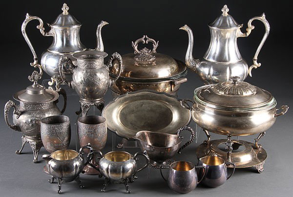 VICTORIAN & LATER SILVER PLATE HOLLOWWARE GROUP: A VICTORIAN AND LATER SILVER PLATE HOLLOWWARE GROUP, MID-19TH TO MID-20TH CENTURY. 14 pieces comprising a Meriden covered sugar and spooner, two Meriden presentation goblets inscribed "Aaron Town from