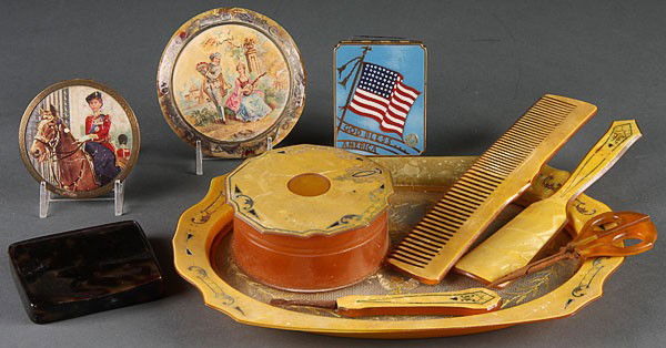 A VINTAGE VANITY CASE GROUP, 19TH/20TH CENTURY. C: A VINTAGE VANITY CASE GROUP, 19TH/20TH CENTURY. Comprising a fine tortoise shell hinged card case, an enameled flag compact, a Queen Elizabeth portrait compact marked "Stratton", a faux tortoise compa