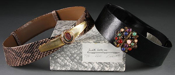 2 JUDITH LEIBER DESIGNER SNAKESKIN BELTS: A PAIR OF JUDITH LEIBER SNAKESKIN BELTS, LATE 20TH CENTURY in rattlesnake with intaglio cameo buckle and black faux snakeskin with jeweled cabochon buckle. Each marked Judith Leiber, one contained in