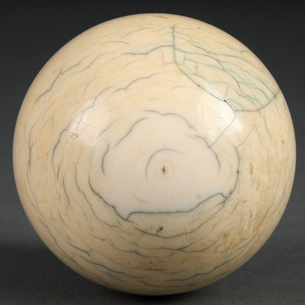 A VINTAGE IVORY CUE BALL. Diameter 2 inches.: A VINTAGE IVORY CUE BALL. Diameter 2 inches.