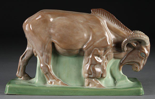 A ZSOLNAY ART DECO GLAZED PORCELAIN RAM: A ZSOLNAY ART DECO GLAZED PORCELAIN FIGURE OF A RAM, EARLY 20TH CENTURY, impressed mark and shape #5517. Length 14.5 inches.