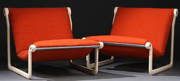 A PAIR OF KNOLL MODERN UPHOLSTERED LOUNGE CHAIRS,: A PAIR OF KNOLL MODERN UPHOLSTERED LOUNGE CHAIRS, CIRCA 1970. With orange upholstered sling cushions on aluminum and chromed frames with ivory enamel. Height 25.5 inches, width 29 inches