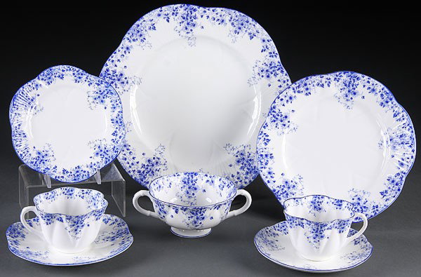 AN ENGLISH SHELLEY DAINTY BLUE PATTERN DINNERWARE: AN ENGLISH SHELLEY DAINTY BLUE PATTERN DINNERWARE SERVICE, 56 pieces comprising eight of each: 8.25 inch plates, 10.75 inch plates, 6 inch salad plates, 5.625 inch saucers, 6.125 inch saucers, bouillo