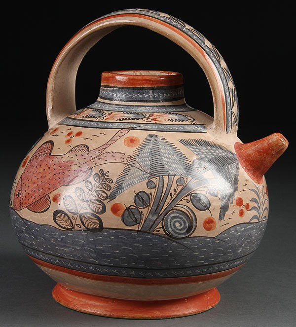A MATEOS, MEXICO POLYCHROME POTTERY HANDLED JUG, : A MATEOS, MEXICO POLYCHROME POTTERY HANDLED JUG, finely decorated with stylized scenes of fish and various plant life. Inscribed on base "Mateos, Mexico." Height 9.25 inches.
