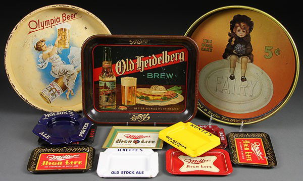 AN OLYMPIA AND BLATTS BEER AND FAIRY SOAP LITHOGR: AN OLYMPIA AND BLATTS BEER AND FAIRY SOAP LITHOGRAPH SERVING TRAY GROUP, EARLY 20TH CENTURY. Together with nine advertising lithograph metal tip trays and ash trays, consisting of a Blatts Old Heidelb