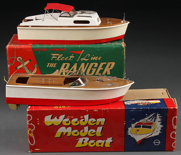 TWO JAPANESE BATTERY OPERATED WOODEN MODEL BOATS,: TWO JAPANESE BATTERY OPERATED WOODEN MODEL BOATS, MID-20TH CENTURY. Comprising a "Fleetline Ranger Speedboat" (no motor) and a "Union Wooden Model Boat", both near mint in original boxes. Length 12 in