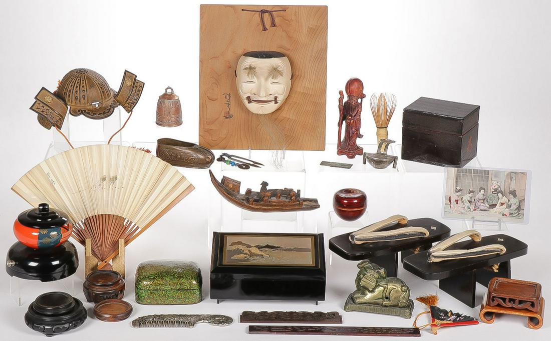 MIXED ASIAN DECORATIVE ARTS GROUP: MIXED ASIAN DECORATIVE ARTS GROUP. Comprising over 30 mostly Japanese items, including a pair of lacquered and mother of pearl decorated Geta, a miniature iron kabuto, a lacquer jewelry box, the hinge