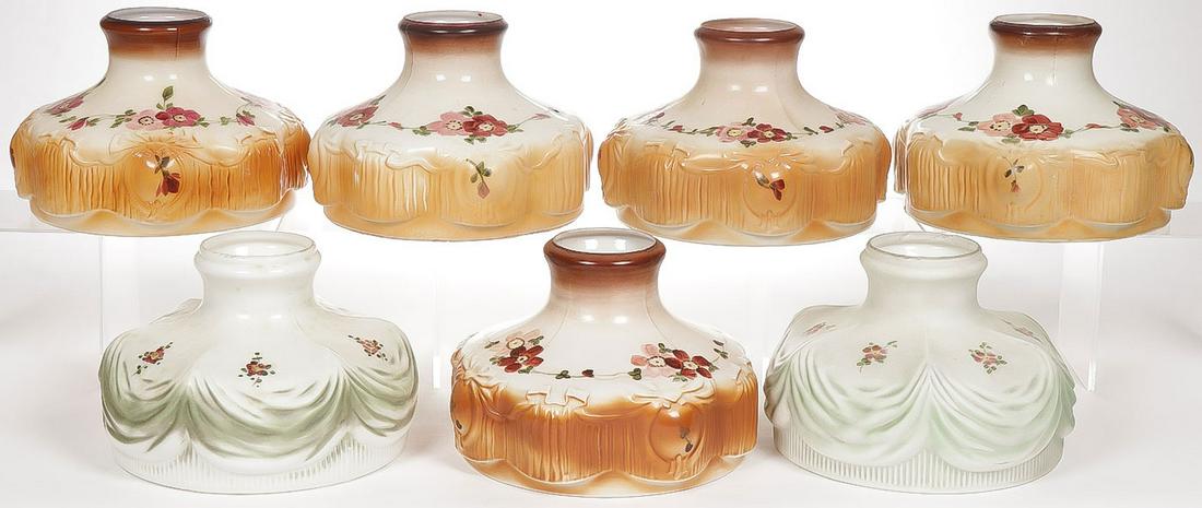 SEVEN HAND-PAINTED LAMP SHADES CIRCA 1920: SEVEN HAND-PAINTED LAMP SHADES CIRCA 1920. Comprising seven individual Coleman shades, including five matching tan to brown Model 318 Rosebud shades with hand-painted roses and foliage, and tw